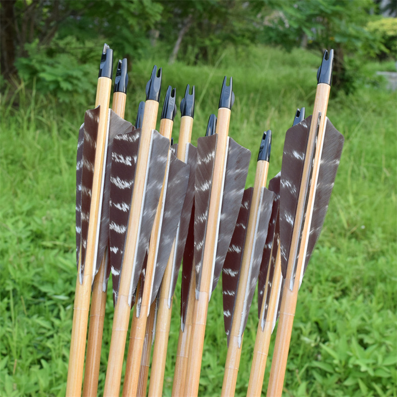 Flechas de madeira para arqueiros tradicionais